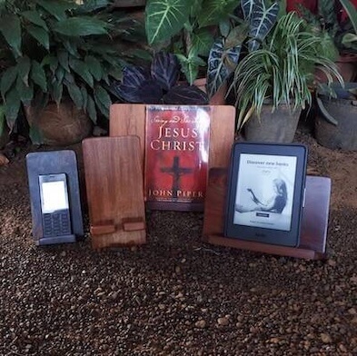 Assorted book and mobile device stands.